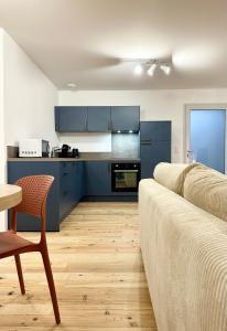 Kuchyň nebo kuchyňský kout v ubytování Les Suites de Molière