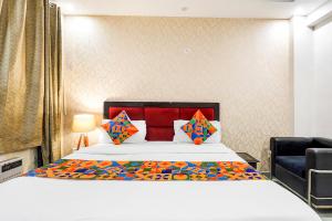 Ένα ή περισσότερα κρεβάτια σε δωμάτιο στο FabHotel Novis House