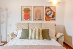 Ένα ή περισσότερα κρεβάτια σε δωμάτιο στο Porta Romana Vibes - A Truly Milanese Escape +14 φωτογραφίες