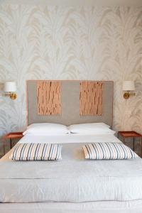 Postel nebo postele na pokoji v ubytování Bontempo Suite + 20 fotografií