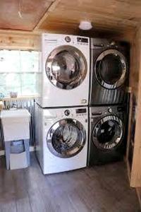 three washing machines and a washer and dryer in a room at Amazing Conestoga Wagon for the Perfect Forest Getaway near Bryce Canyon, Utah in Alton +6 photos