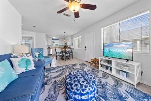 Μια τηλεόραση ή/και κέντρο ψυχαγωγίας στο Wolf Bay Villas 209 +31 φωτογραφίες