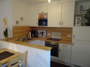 Η κουζίνα ή μικρή κουζίνα στο Perlmuschel