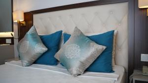 Ένα ή περισσότερα κρεβάτια σε δωμάτιο στο Cleopatra Golden Beach Hotel