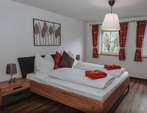 Postel nebo postele na pokoji v ubytování Hohlbichlgut