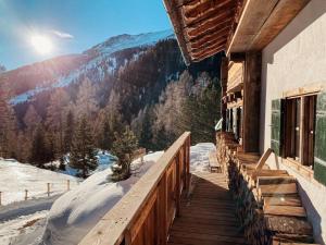 a stairway to a house with a view of the mountains at Turracher Hütte in Turracher Hohe