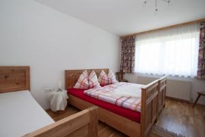 Postel nebo postele na pokoji v ubytování Stollenberghütte