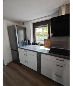 Kuchyň nebo kuchyňský kout v ubytování Haus Kerkyra