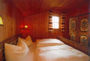 Postel nebo postele na pokoji v ubytování Vordergottschallalm