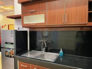 Η κουζίνα ή μικρή κουζίνα στο Griya Nuansa Syariah +18 φωτογραφίες