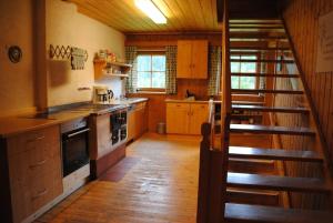 Kuchyň nebo kuchyňský kout v ubytování Maierlehenalm