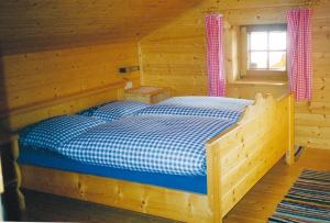 Postel nebo postele na pokoji v ubytování Maierlehenalm