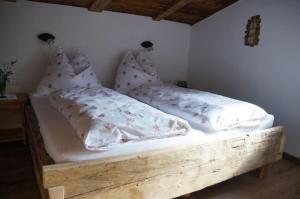 Ένα ή περισσότερα κρεβάτια σε δωμάτιο στο Tröglesalm