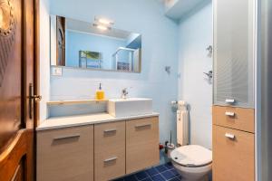 Phòng tắm tại Hostdomus - City Center Apartment