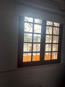 a stained glass window in a building at De beachside Villa in Virāmpattinam
