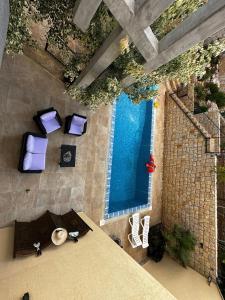 Μια τηλεόραση ή/και κέντρο ψυχαγωγίας στο Khalil's Heaven Villa +13 φωτογραφίες