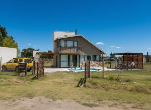 a house with a pool in front of it at Villa Bella vista 2024 in San Rafael