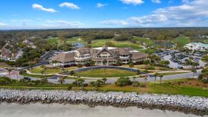 an aerial view of a large house with a large yard at PW1369: 1369 Pelican Watch in Seabrook Island