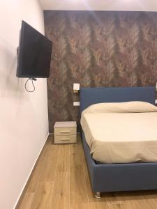 Postel nebo postele na pokoji v ubytování Il rifugio del mare - 800 m dalla spiaggia - vista mare