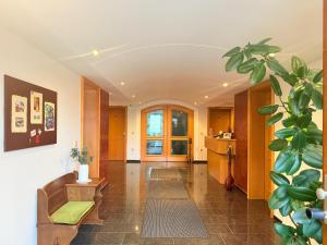 a living room with a couch and a table at Hotel Alt Oesselse in Hannover