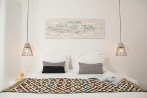 Postel nebo postele na pokoji v ubytování Irida Vacation Suites