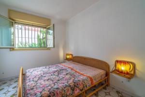 Ένα ή περισσότερα κρεβάτια σε δωμάτιο στο Eremo degli Oleandri with pool +26 φωτογραφίες