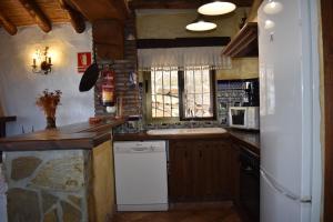 Η κουζίνα ή μικρή κουζίνα στο Finca Algarabia with private Pool