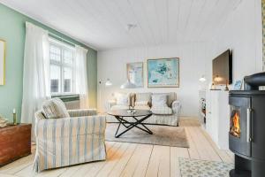 Μια τηλεόραση ή/και κέντρο ψυχαγωγίας στο Skipper House With Views Of The North Sea