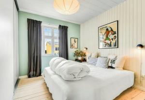 Ένα ή περισσότερα κρεβάτια σε δωμάτιο στο Skipper House With Views Of The North Sea