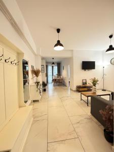 TV a/nebo společenská místnost v ubytování TOD APARTMENTS Palas Mall