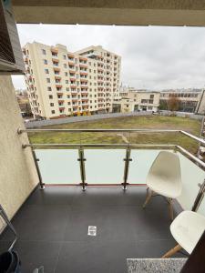Balkón nebo terasa v ubytování TOD APARTMENTS Palas Mall