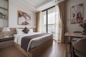 Postel nebo postele na pokoji v ubytování Hermes Housing- Masteri West Heights