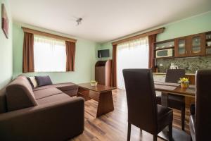 Posezení v ubytování Holiday Park Orava Apartments