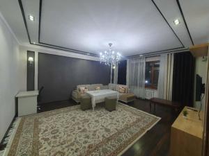 Ένα ή περισσότερα κρεβάτια σε δωμάτιο στο Сдается 3 комнатная квартира в аренду