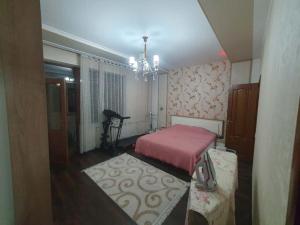 Ένα ή περισσότερα κρεβάτια σε δωμάτιο στο Сдается 3 комнатная квартира в аренду