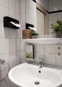 Ένα μπάνιο στο Hotel Mercedes City