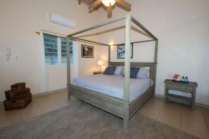 Postel nebo postele na pokoji v ubytování Turtle Cove House by Le Haus + 19 fotografií