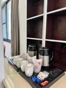 Příslušenství pro přípravu čaje a kávy v ubytování Hotel La Sera