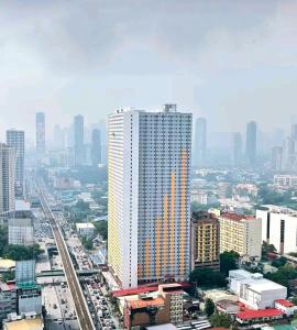 Nespecifikovaný výhled na destinaci Manila nebo výhled na město při pohledu z hostelu