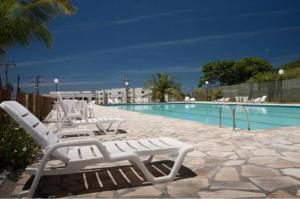 Bazén v ubytování Maravilhosos Apartamento completo Marina Clube nebo v jeho okolí