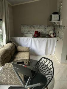 a living room with a couch and a table at A melhor localização de Belém do Pará in Belém +10 photos
