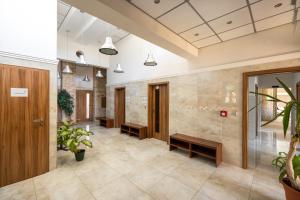 Vstupní hala nebo recepce v ubytování Holiday Park Orava Apartments + 46 fotografií