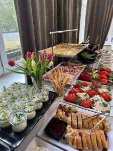 a buffet line with many different types of food at Fregata Kołobrzeg in Kołobrzeg