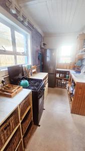 Η κουζίνα ή μικρή κουζίνα στο Little Pearl in Bettys Bay