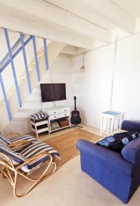 Μια τηλεόραση ή/και κέντρο ψυχαγωγίας στο Little Pearl in Bettys Bay