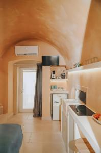 Η κουζίνα ή μικρή κουζίνα στο Grotta Angolo Laggetto