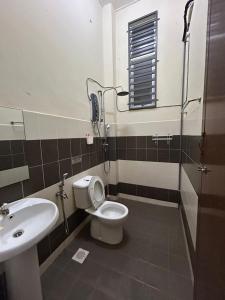 Koupelna v ubytování Homestay Teratak Mansha Balok Perdana, Kuantan, Pahang
