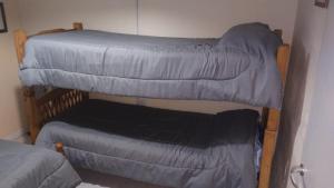 Voodi või voodid majutusasutuse Del Sur Alojamiento toas