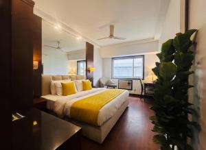 Ένα ή περισσότερα κρεβάτια σε δωμάτιο στο Hotel The Prime, Har Ki Pauri, Haridwar +10 φωτογραφίες