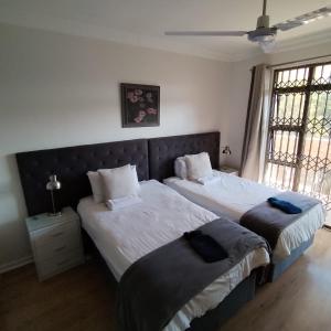 Fotografie z fotogalerie ubytování Paulshof Guesthouse - Kingsway B&B v destinaci Sandton